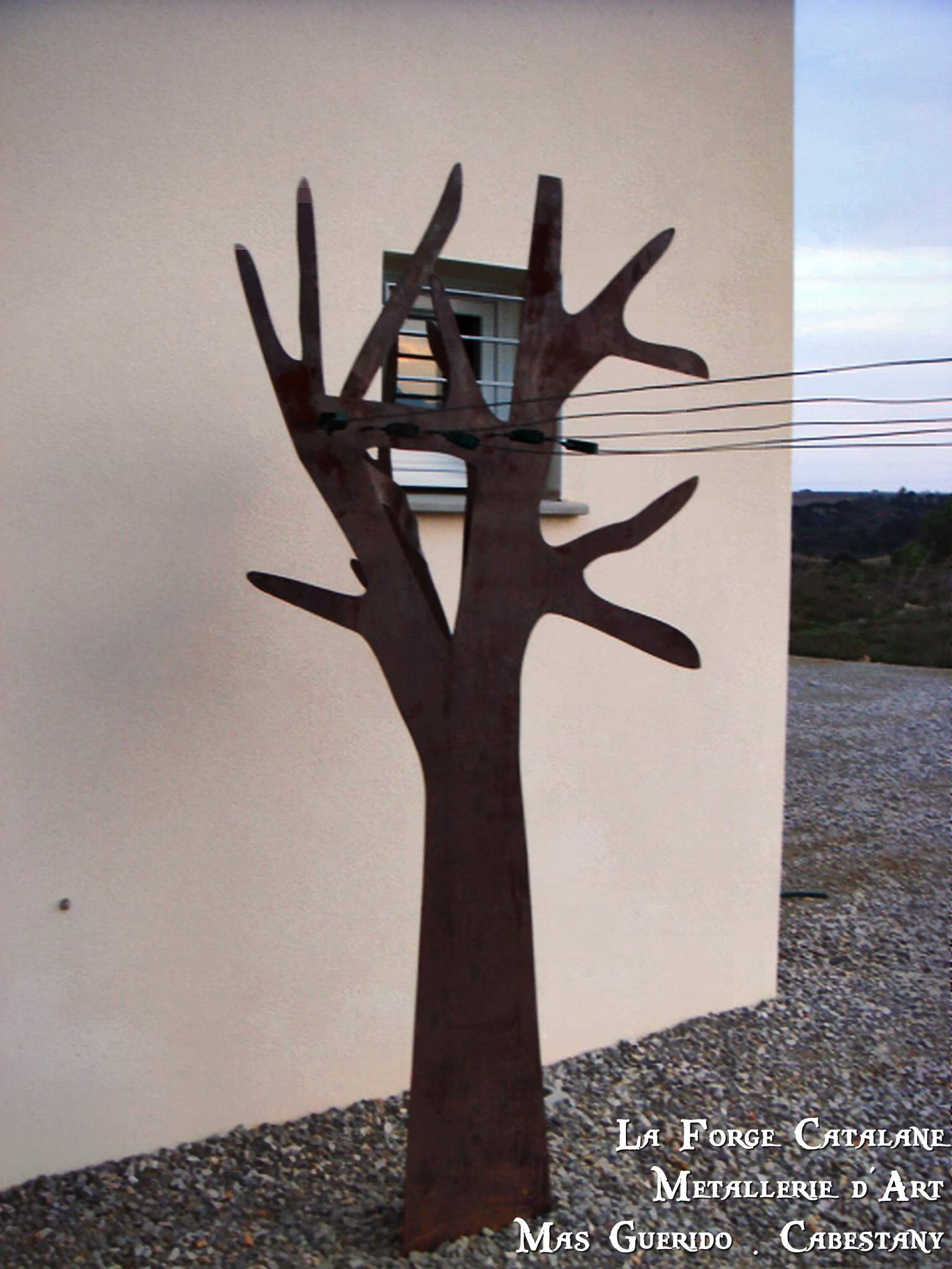 etendoir en fer imitation arbre  forge catalane.jpg
